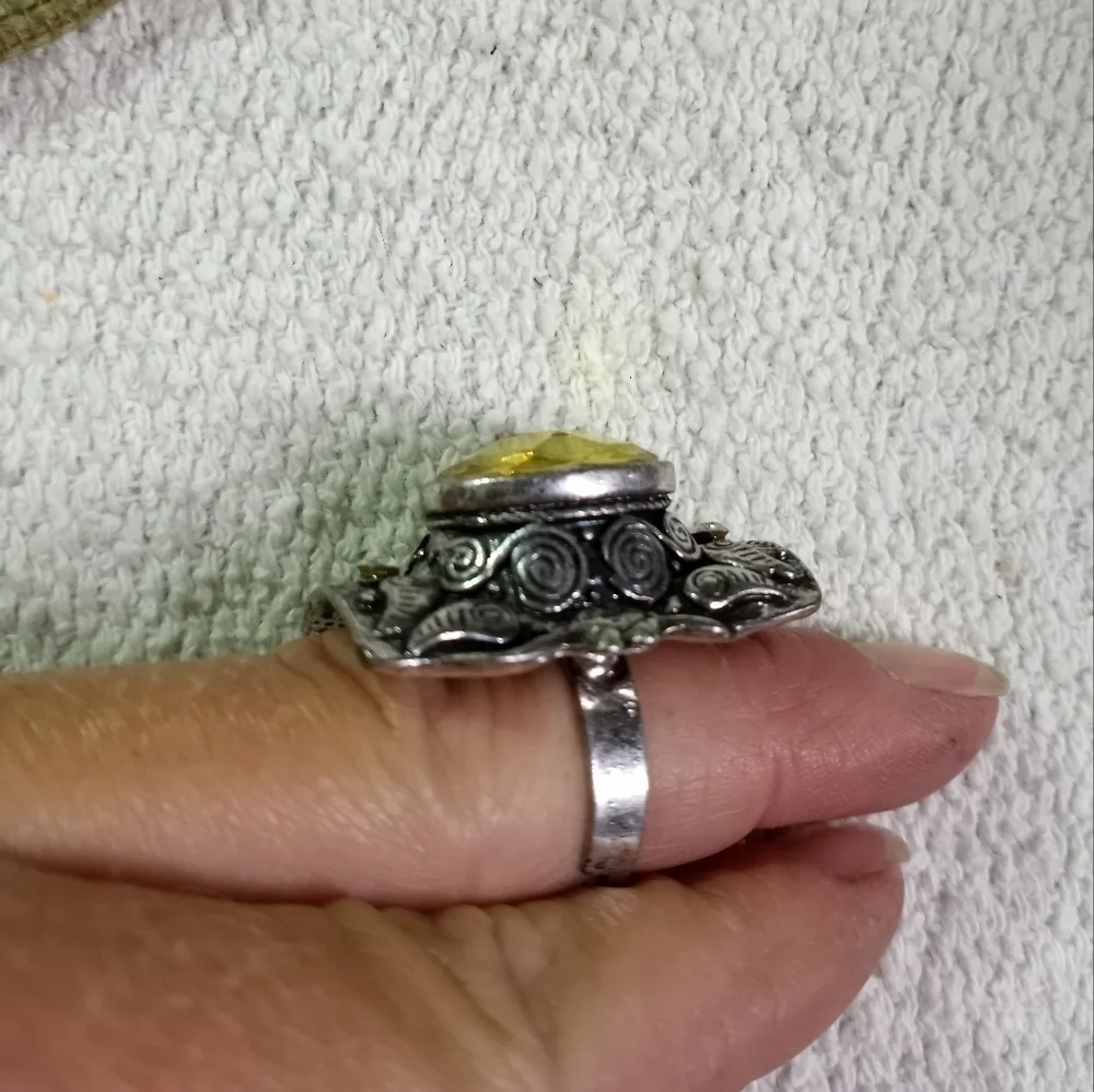Silvertone large yellow stone decorative adjustable ring